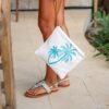 Embroidered Palm Bikini Bag – white woven pouch with turquoise palm embroidery and waterproof lining