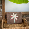 Coco pop clutch woven palm bag Mimpi Mannis